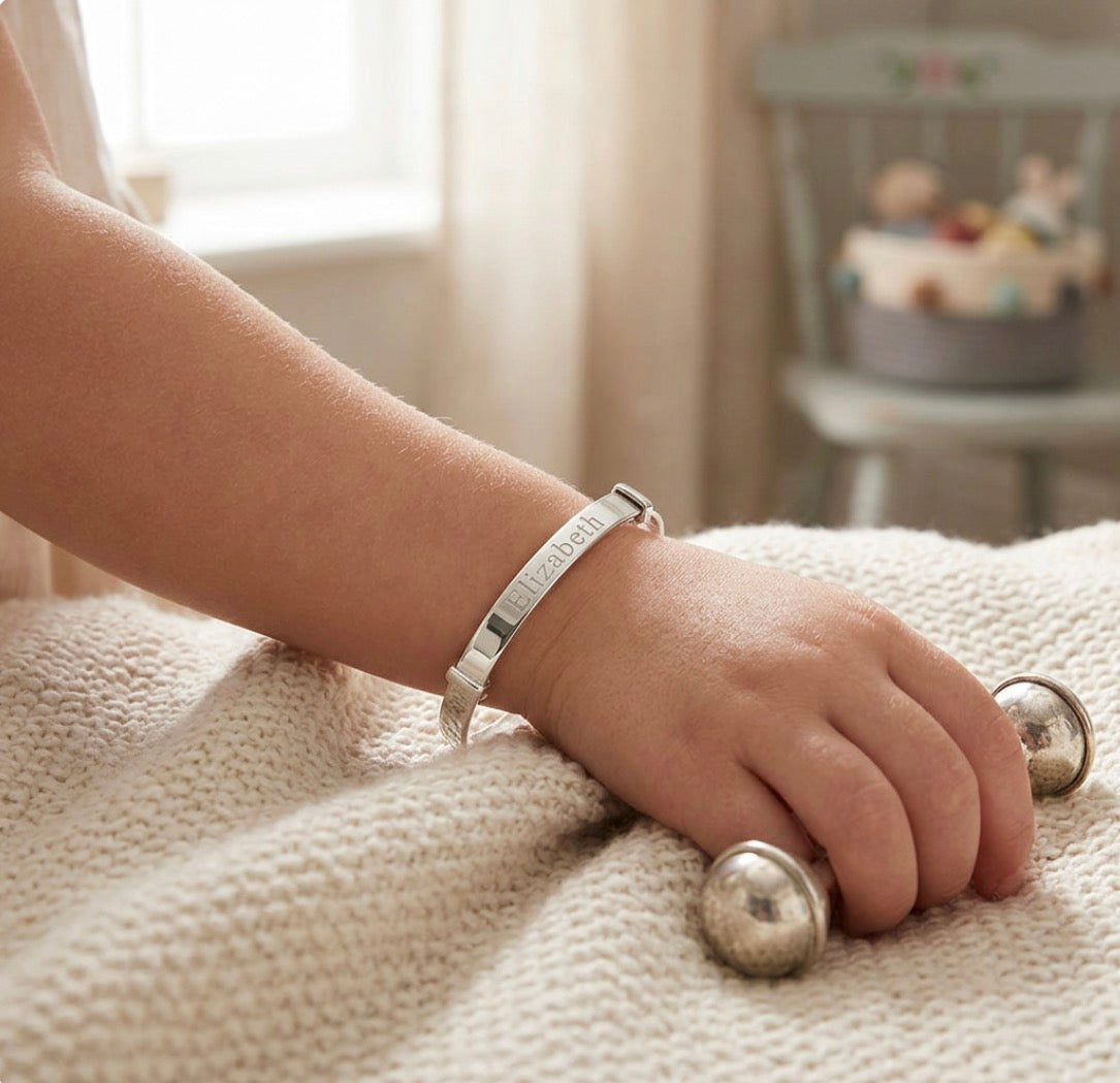 Engraved sliver expandable baby bangle